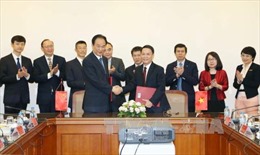 Thông tấn xã Việt Nam và Tân Hoa xã ký Thỏa thuận hợp tác mới 